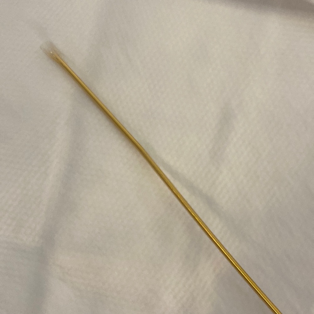 Thin gold stretchy string belt
